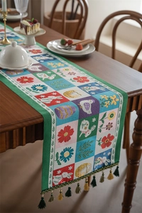 Detailed woven jacquard Easter table runner with rabbit patterns and colorful tassels