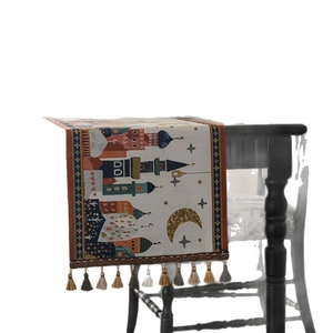 Eid Moon & Castle table runner with stars and camel jacquard patterns and tassels