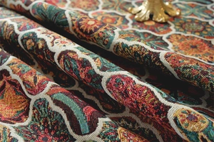 Close-up of bohemian floral jacquard fabric with vintage mandala patterns and tassels