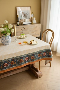 Macro detail of Bohemian jacquard tablecloth with floral borders and woven texture