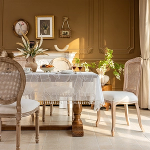 Elegant white French lace tablecloth with palm leaf pattern and delicate fringe tassels