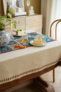 Close-up of bohemian floral jacquard fabric with geometric patterns on table runner