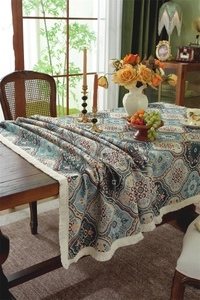 Detailed close-up of retro jacquard ethnic table runner with cotton fringe tassels