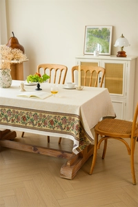 Detail of vintage floral pattern border and jacquard texture on rectangular tablecloth