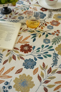 Macro shot of jacquard weave fabric with retro floral patterns and detailed texture