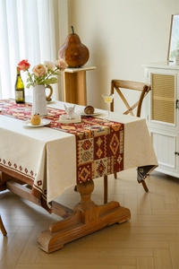 Close-up of bohemian geometric jacquard patterns on premium woven linen tablecloth
