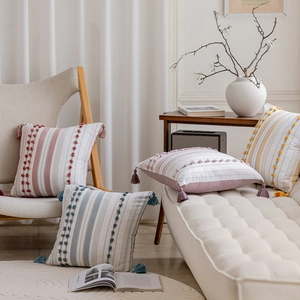Nordic boho tufted cushion covers with tassels in pink, blue and yellow stripes set