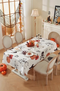 Detailed pattern of Halloween pumpkin and skull prints on durable polyester tablecloth