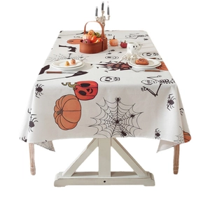 Halloween polyester tablecloth featuring pumpkin and bat prints for festive dining decor