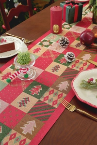 Close-up of yarn-dyed jacquard Christmas table runner with festive tree patterns
