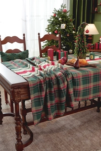 Close-up of thick plaid Christmas table runner with red and green woven texture