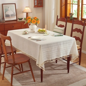 Bohemian style linen-textured tablecloth with elegant stripes and fringe trim decor