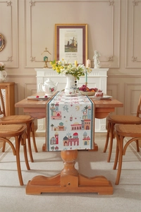 Close-up of Middle East jacquard table runner with moon, castle, and palm tree patterns