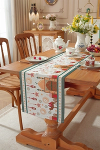 Close-up of jacquard table runner with mosque, stars, and crescent moon patterns