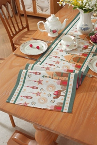 Close-up of woven jacquard table runner with mosque stars and tassel details