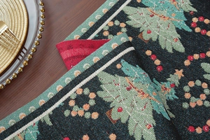 Close-up of jacquard Christmas tree patterns and double-sided woven table runner fabric