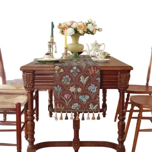 Chemin de table rétro en jacquard avec motifs de tulipes colorées et glands à franges