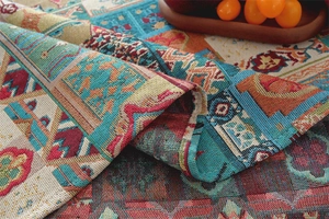 Close-up of thick woven bohemian floral geometric fabric with rich colorful textures