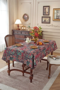 Detailed view of bohemian geometric floral tablecloth with vintage jacquard woven texture