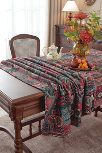 Detailed view of bohemian jacquard tablecloth with geometric patterns and floral motifs