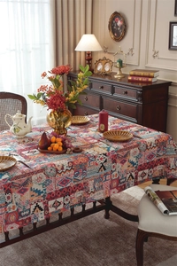 Detailed macro view of woven geometric and floral patterns on Bohemian tablecloth fabric