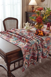 Close-up of bohemian floral geometric jacquard tablecloth with vintage aesthetic