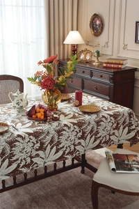 Close-up of vintage tropical floral jacquard tablecloth with thick cotton texture