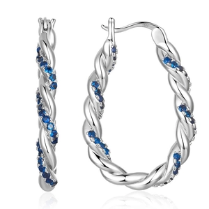 Macro view of S925 sterling silver twisted hoop earrings with navy blue zircon inlays