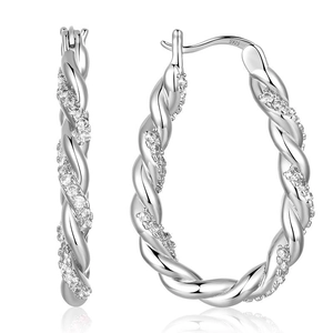 Detail of S925 sterling silver twisted hoop earrings with sparkling zircon inlay