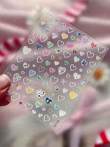 Detail of YT7133 silver heart nail stickers with colorful checkered patterns and dots