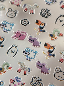 Detail of 3D embossed cartoon animal nail stickers with transparent resin finish