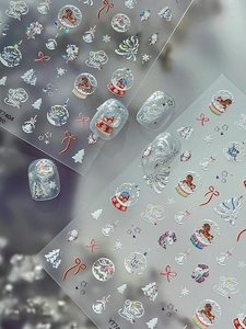 Detailansicht der Weihnachts-Nagelaufkleber mit Rentier- und Schneeflockenmotiven