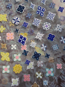 Macro shot of 5D embossed bohemian blue porcelain nail art stickers style YT7573
