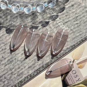 Sparkly glitter lines and rhinestone pink press-on nails set with glossy finish