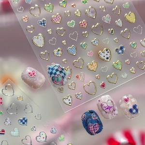 Y2K silver heart nail art stickers with colorful plaid patterns for DIY manicure