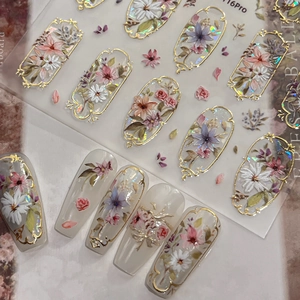 Vintage floral relief nail stickers with gold foil borders and 3D textured flower patterns