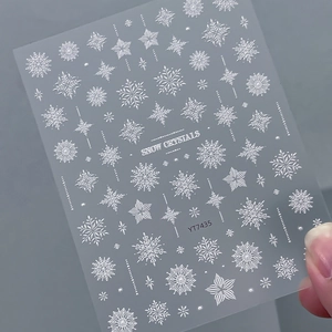 3D embossed white snow crystals nail art stickers with festive snowflake patterns