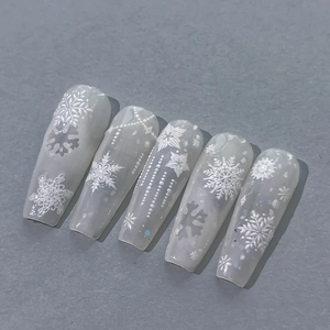 5pcs embossed white snowflake nail stickers with pearls on translucent grey long trapezoid nails