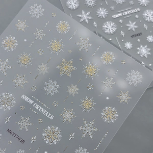 Exquisite embossed snow crystal nail stickers in white and gold for winter nail art