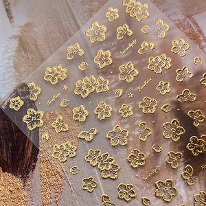 Exquisite gold embossed floral nail art stickers with 3D metallic flower patterns