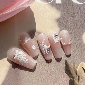 Pink coffin press-on nails with 3D floral relief, pearls, and Rose lettering design