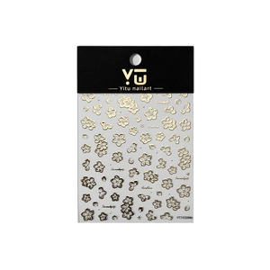 Golden embossed floral nail art stickers with intricate flower patterns on black packaging