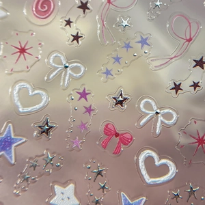 Stickers à ongles 3D étoiles et cœurs aux couleurs pastel avec détails argentés