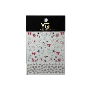 Stickers ongles étoiles argent bleu avec motifs cœur et nœud dans leur emballage