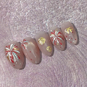 Festive Lunar New Year press-on nails with golden fireworks and traditional Fu characters
