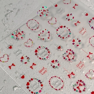 Autocollants 3D holographiques pour ongles avec cœurs et nœuds roses et rouges