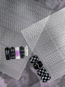 Macro detail of YT-T07 nail stencil showing checkered and diamond patterns for DIY nail art