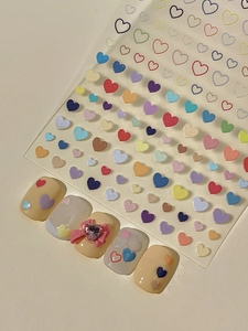 Détails d'autocollants 3D pour ongles en forme de cœur avec nuances de macarons