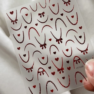 Stickers ongles rouge pailleté avec motifs cœurs et nœuds en relief 5D, modèle YT7530