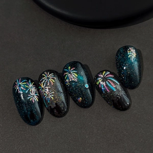 Sparkling black oval press-on nails featuring colorful firework patterns and fine glitter